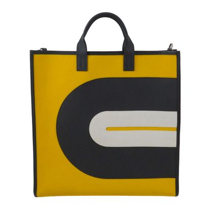 HERMÈS
Sac Hermès fourre-tout en toile jaune...