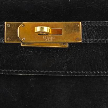 HERMÈS
Sac vintage Hermès Kelly en cuir noir,...