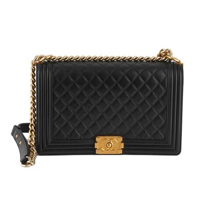 CHANEL BOY
Sac Chanel Boy en cuir noir matelassé,...