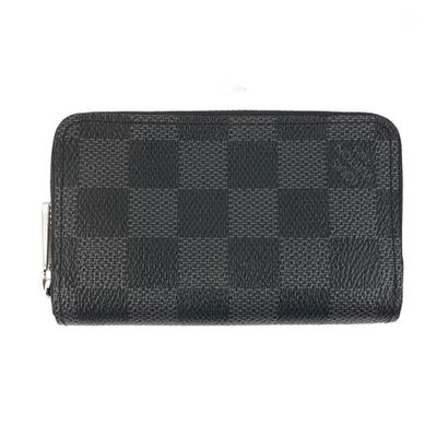 LOUIS VUITTON
Porte-monnaie Louis Vuitton...