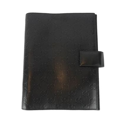 GUCCI
Agenda Gucci en cuir noir Guccissima.
H:...