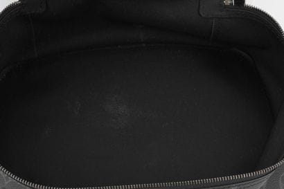 LOUIS VUITTON 
Toiletry Bag in Black Monogram...