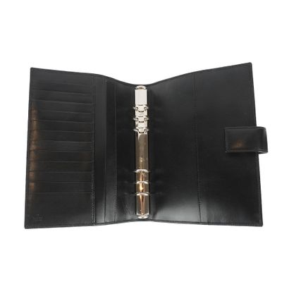 GUCCI
Agenda Gucci en cuir noir Guccissima.
H:...