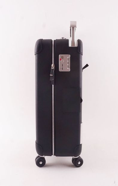 HERMÈS
Valise de cabine à roulettes Hermès...