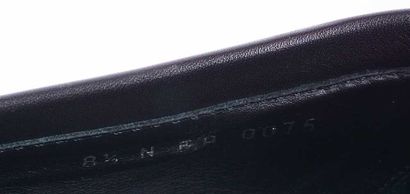 LOUIS VUITTON
Paire de mocassins en cuir...