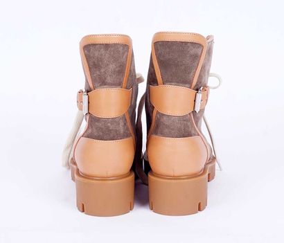 LOUBOUTIN
Bottes plates moto Macademia à...