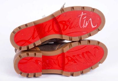 LOUBOUTIN
Bottes plates moto Macademia à...