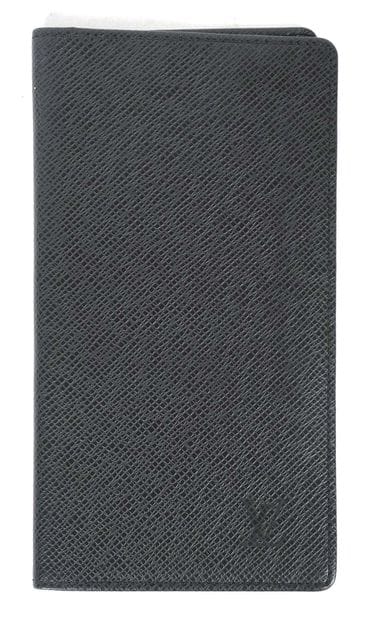 LOUIS VUITTON 
Portefeuille en cuir noir...