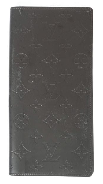 LOUIS VUITTON 
Porte-feuille en cuir noir...