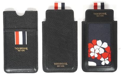 THOM BROWNE
3 étuis à portable en cuir noir...