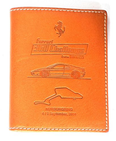 FERRARI
Attaché-case en cuir marron-orangé...