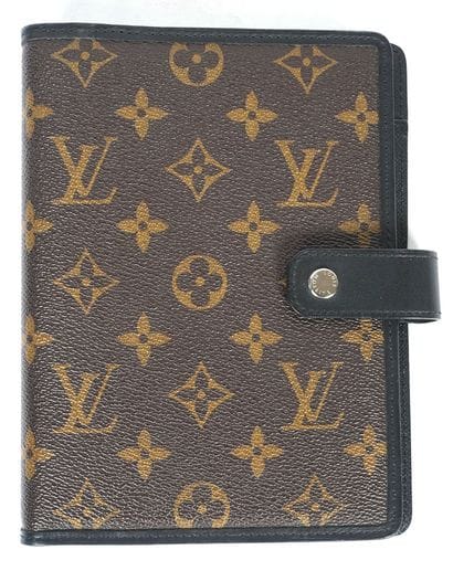LOUIS VUITTON 
Agenda Louis Vuitton en toile...