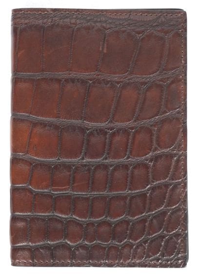 GUCCI 
Porte-monnaie Gucci en cuir marron,...