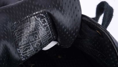 BOSS MERCEDES
Paire de baskets en cuir noir...