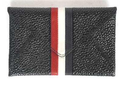 THOM BROWNE
Petit porte-monnaie en cuir noir...