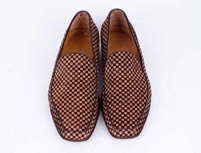 LOUIS VUITTON
Paire de mocassins en suède...