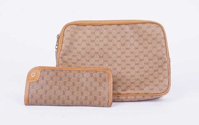 GUCCI
Pochette Gucci en toile Monogrammée,...