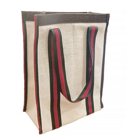 GUCCI
Sac Gucci en toile crème à 2 anses...