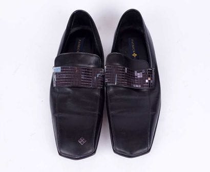 PATRICK COX
Paire de mocassins en cuir marron...