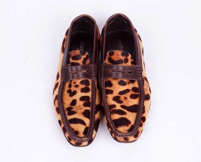 DOLCE GABBANA
Paire de mocassins en cuir...