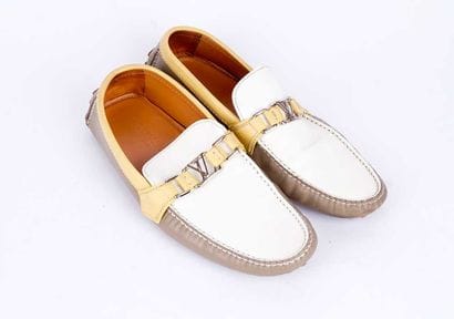 LOUIS VUITTON
Paire de mocassins tricolore...