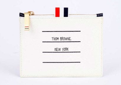 THOM BROWNE
Pochette Thom Browne en cuir...