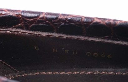 LOUIS VUITTON
Paire de mocassins en cuir...