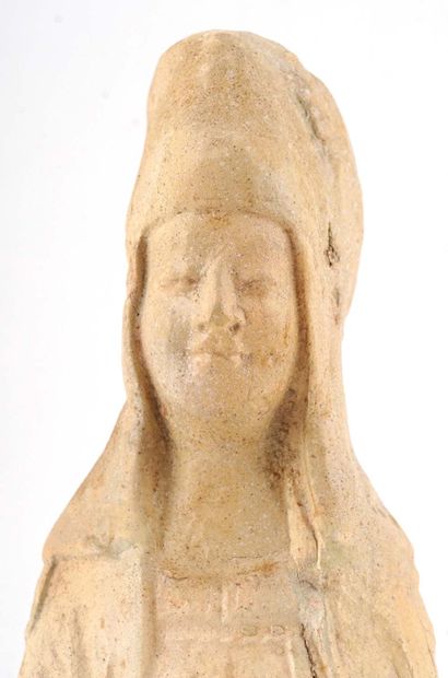 TANG DYNASTY

Terracotta statuette depicting...