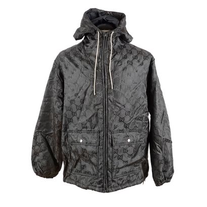 GUCCI
Manteau à capuche gris foncé GG
Taille...