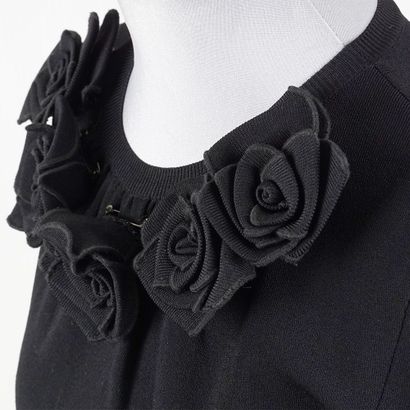 VALENTINO
Black Valentino knitwear. Neckline...