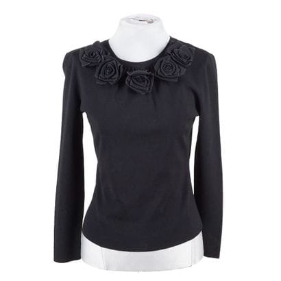 VALENTINO
Black Valentino knitwear. Neckline...