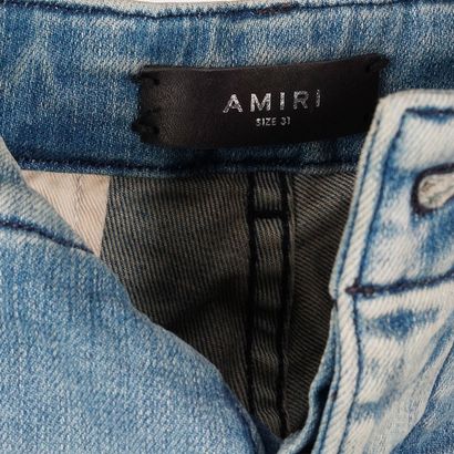 AMIRI
Jeans avec multiples pochettes
Taille...