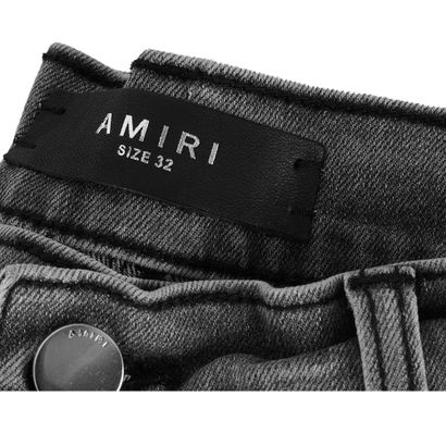 AMIRI
Jeans avec déchirures
Taille 32
Jeans...