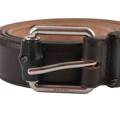 GUCCI 
Ceinture de cuir marron avec boucle...