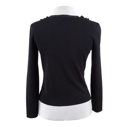 VALENTINO
Black Valentino knitwear. Neckline...