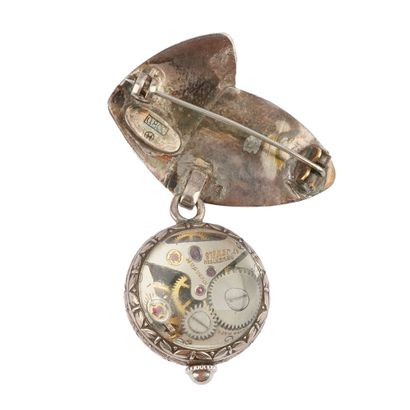 HUGUENIN
Ancienne montre broche Huguenin...