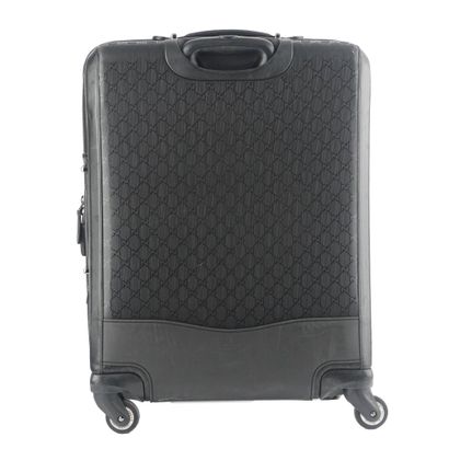 GUCCI
Gucci Monogram canvas rolling suitcase...