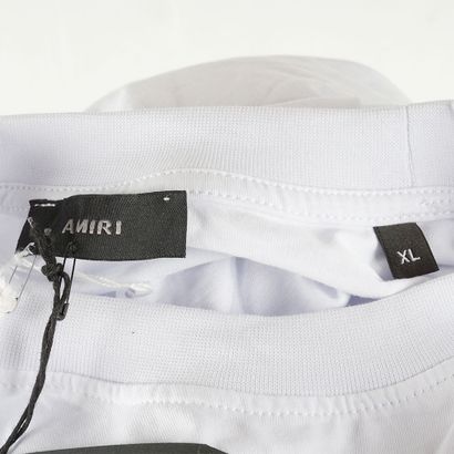 AMIRI
T-shirt blanc à logotype au motif d'éclaboussures....