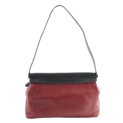 HERMÈS
Sac vintage Hermès en cuir bourgogne,...
