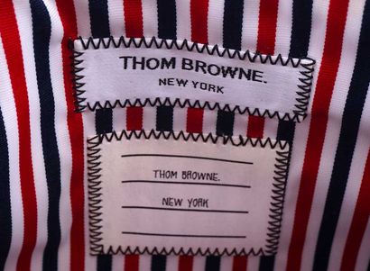 THOM BROWNE
Thom Browne clutch in cream and...