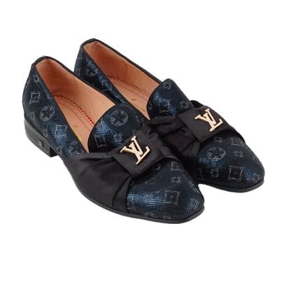LOUIS VUITTON 
Paire de mocassins en cuir...