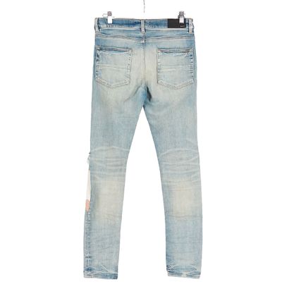 AMIRI
Jeans avec multiples pochettes
Taille...