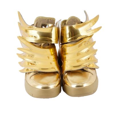 ADIDAS X JEREMY SCOTT
Baskets en cuir doré...