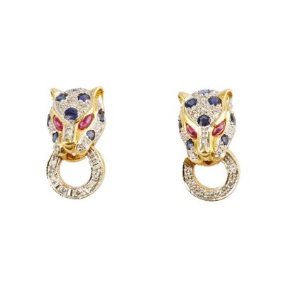 DANS LE GOÛT DE CARTIER PANTHÈRE
Boucles...
