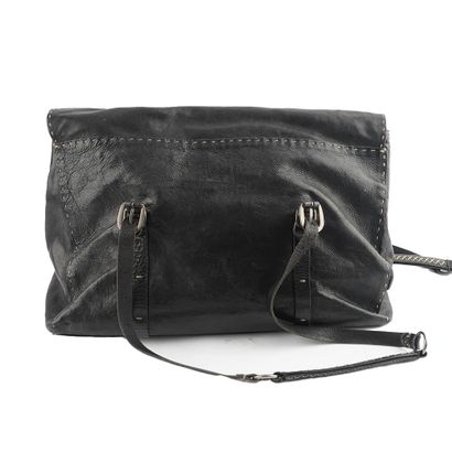 HENRY BEGUELIN
Sac en cuir noir embelli de...