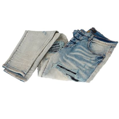 AMIRI
Jeans avec déchirures
Taille 32
Jeans...