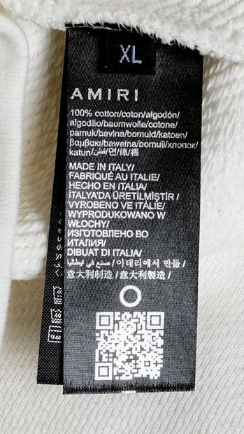 AMIRI
Chandail en cotton ouaté blanc à décor...