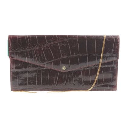 LA BENCI
Sac enveloppe en cuir marron façon...
