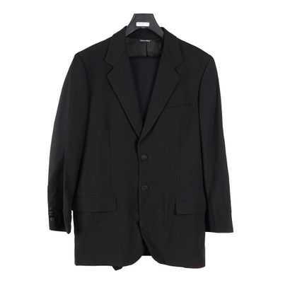 MOSCHINO
Veste tailleur de laine noire dont...