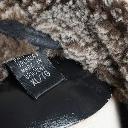 LP UOMO
Black leather winter coat with brown...